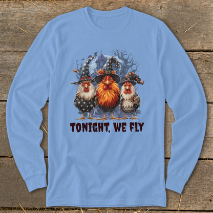 Three witch-hatted chickens stand before a spooky house, with the text "TONIGHT, WE FLY".