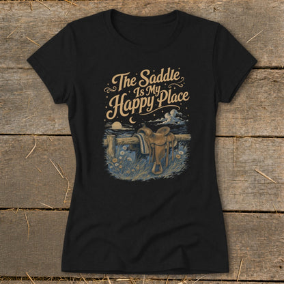 Black t-shirt with "The Saddle Is My Happy Place" text and a saddle on a fence.