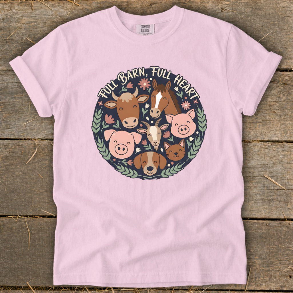 Pink t-shirt with circular barnyard animal design and text "FULL BARN, FULL HEART".
