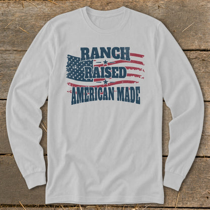 White long sleeve shirt with "Ranch Raised American Made" and American flag graphic.