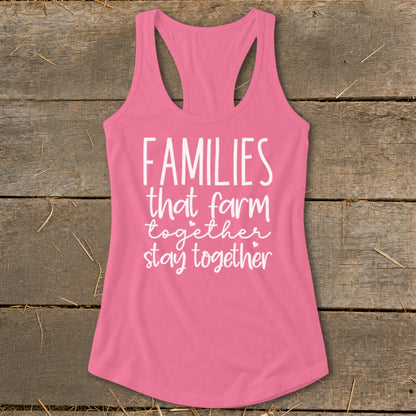 Pink tank top with white text that reads "Families that farm together stay together".