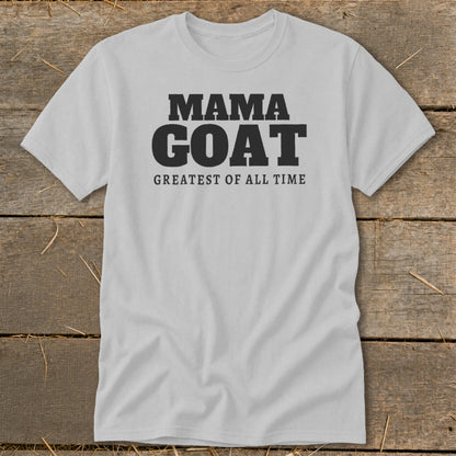 Light grey t-shirt with black text reading "MAMA GOAT GREATEST OF ALL TIME".