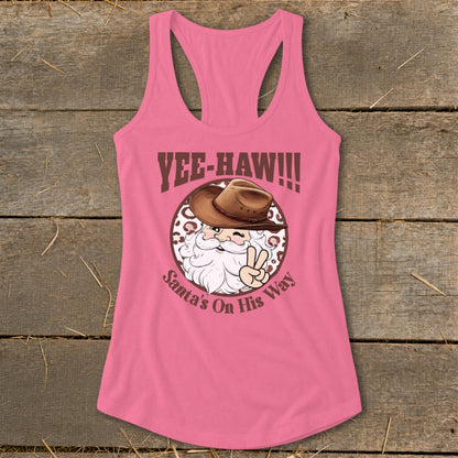 Pink tank top with cowboy Santa graphic and text "Yee-Haw!!!" and "Santa's On His Way".