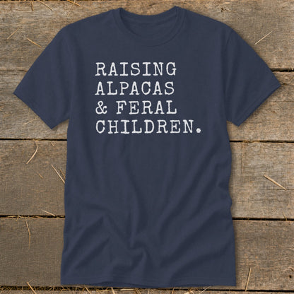Navy t-shirt with white text: "RAISING ALPACAS & FERAL CHILDREN."