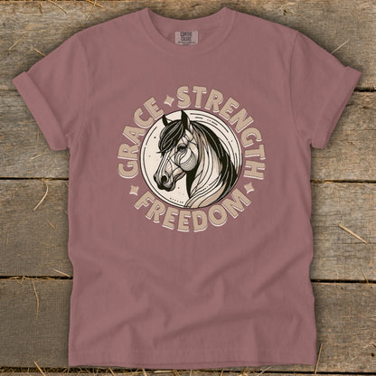 T-shirt with horse head graphic and text "Grace Strength Freedom"