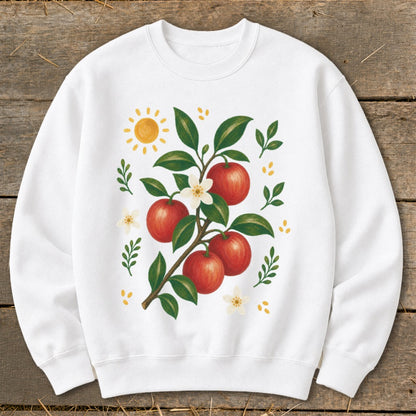 White sweatshirt with a painted apple branch, sun, and flowers design.