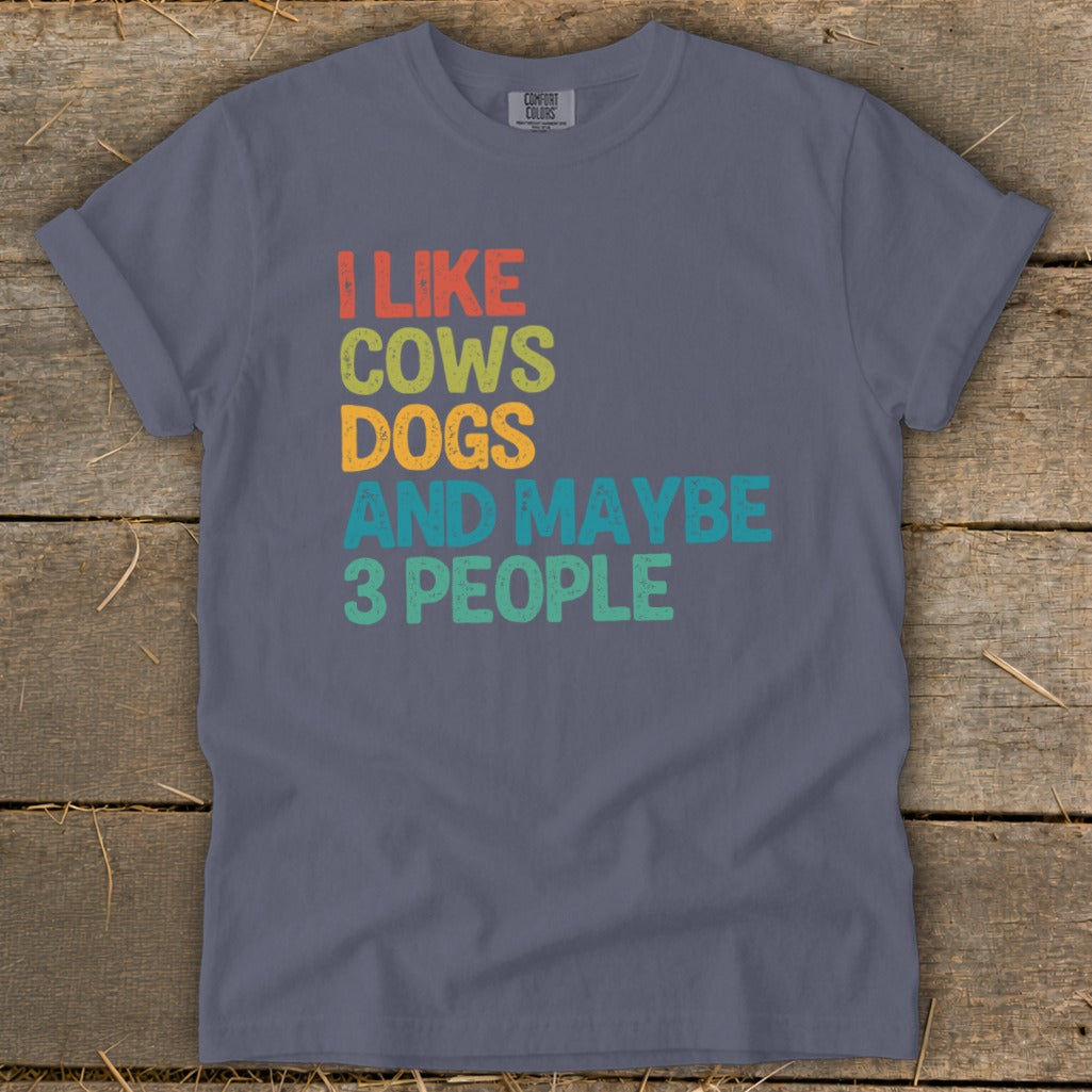 T-shirt with text "I like cows dogs and maybe 3 people."