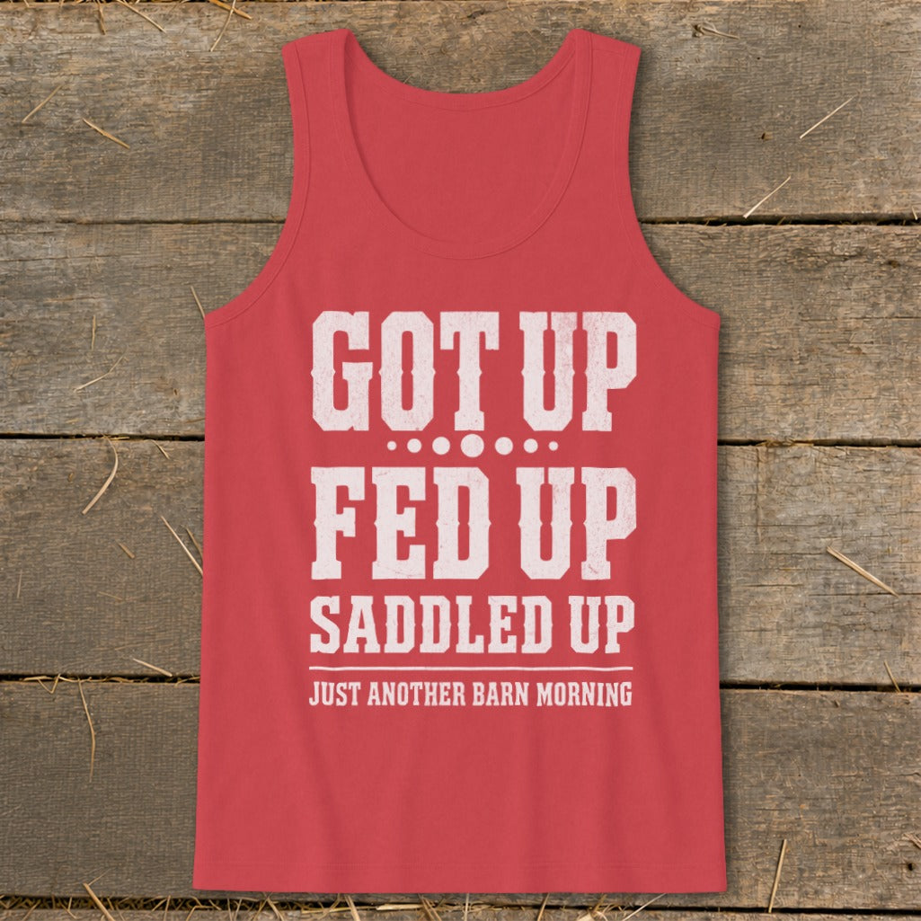 Red tank top with white distressed text: GOT UP FED UP SADDLED UP JUST ANOTHER BARN MORNING.