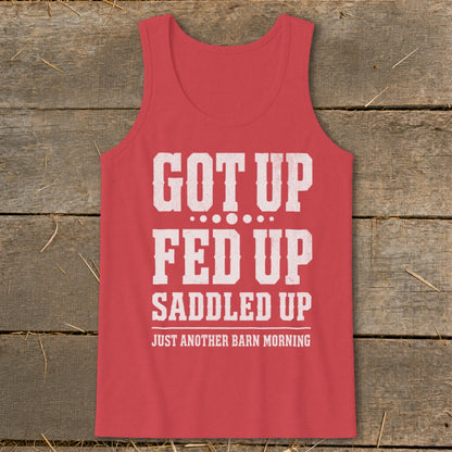 Red tank top with white distressed text: GOT UP FED UP SADDLED UP JUST ANOTHER BARN MORNING.