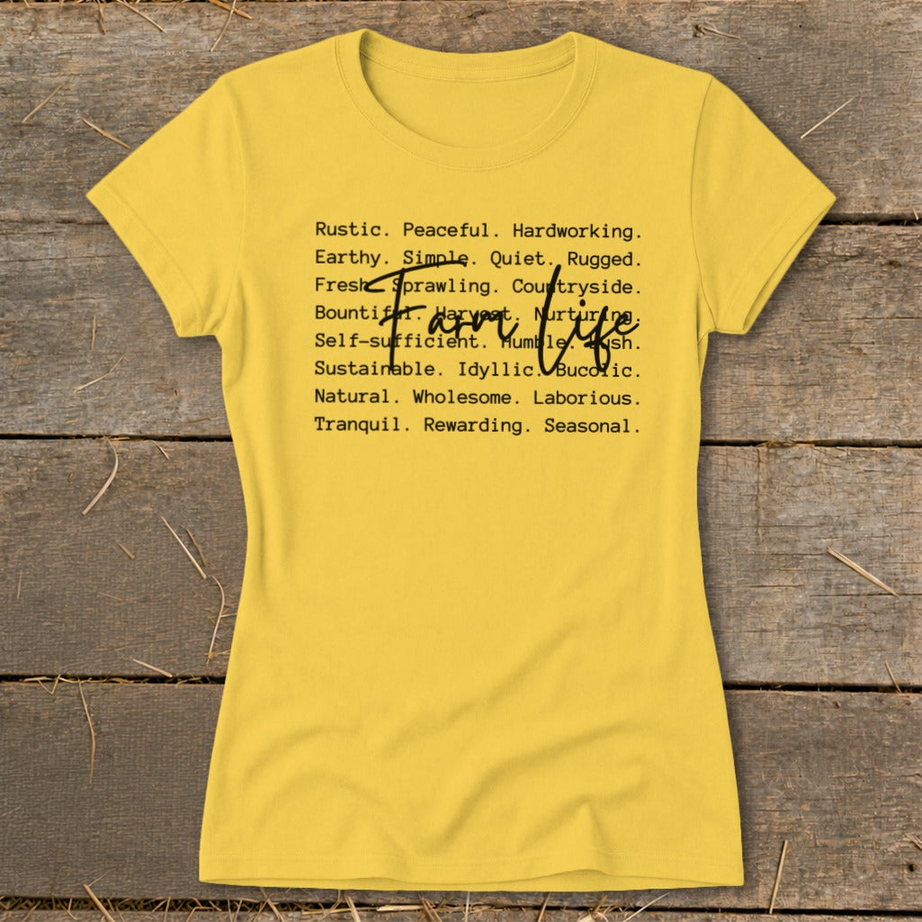 Yellow t-shirt with black text "Farm Life" and descriptive words.