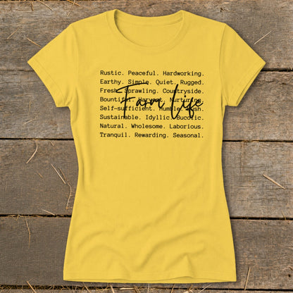 Yellow t-shirt with black text "Farm Life" and descriptive words.