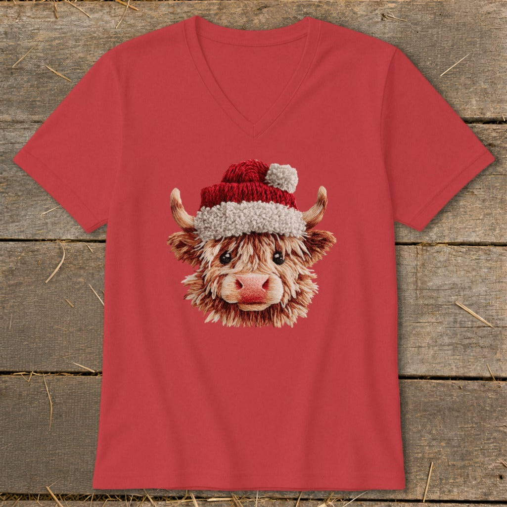 Red v-neck t-shirt with a fluffy Highland cow wearing a Santa hat.