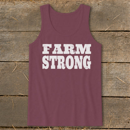 Maroon women's tank top with the white distressed text Farm Strong printed on the chest.