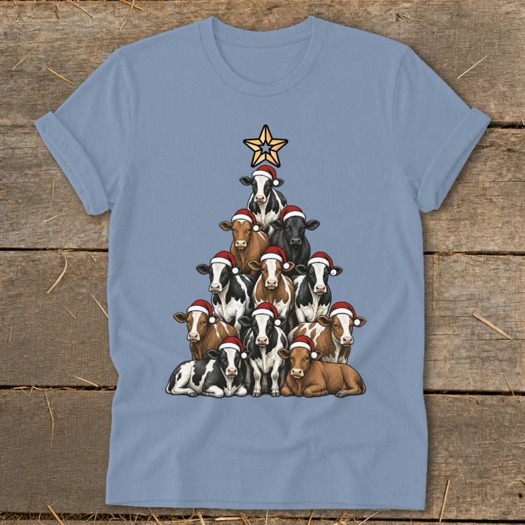 T-shirt with a Christmas tree made of cows wearing Santa hats and a star.