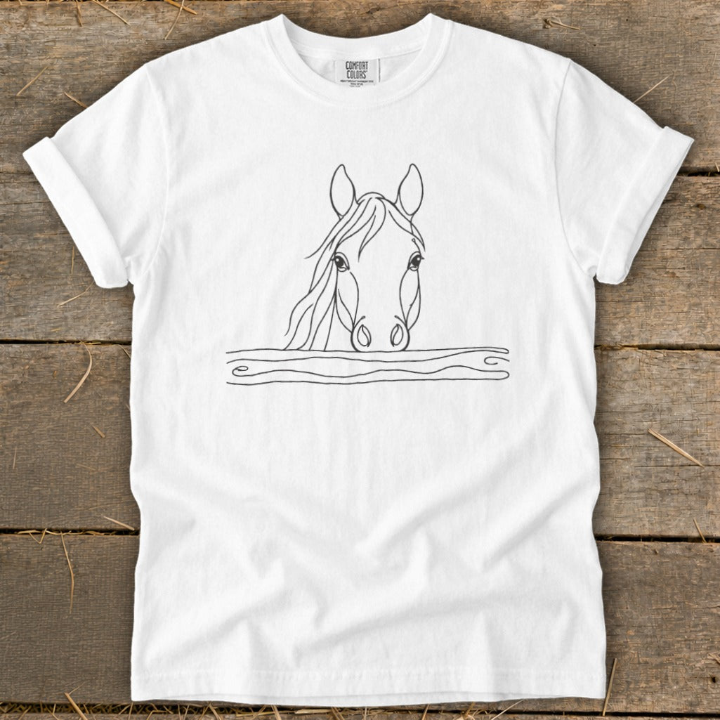 White t-shirt with a minimalist line drawing of a horse's head peeking over a fence.