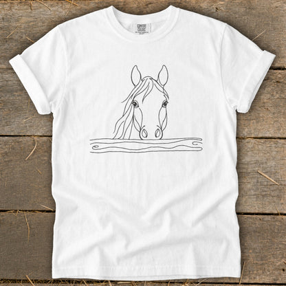 White t-shirt with a minimalist line drawing of a horse's head peeking over a fence.