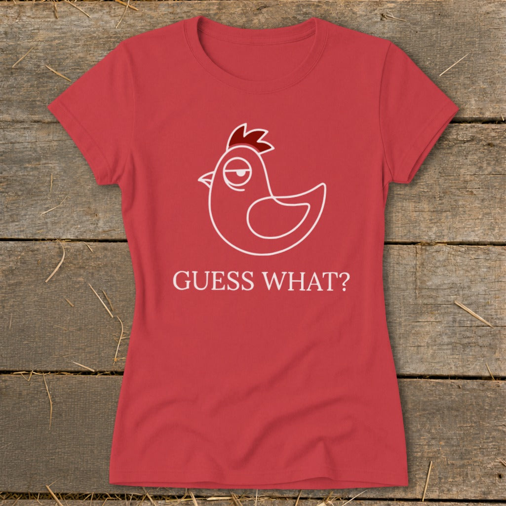 Red t-shirt with white line drawing of a chicken and text "GUESS WHAT?"