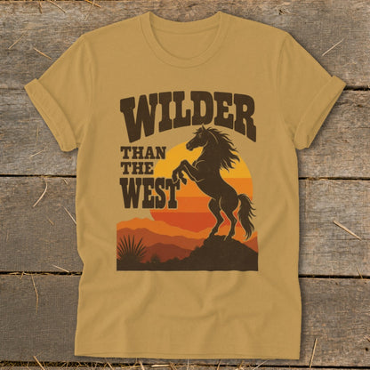 T-shirt with "Wilder Than The West" text and silhouette of a rearing horse at sunset.
