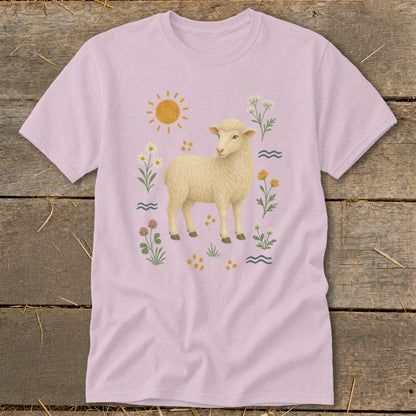 Pink t-shirt with a cream-colored sheep surrounded by flowers, sun, and wavy lines.