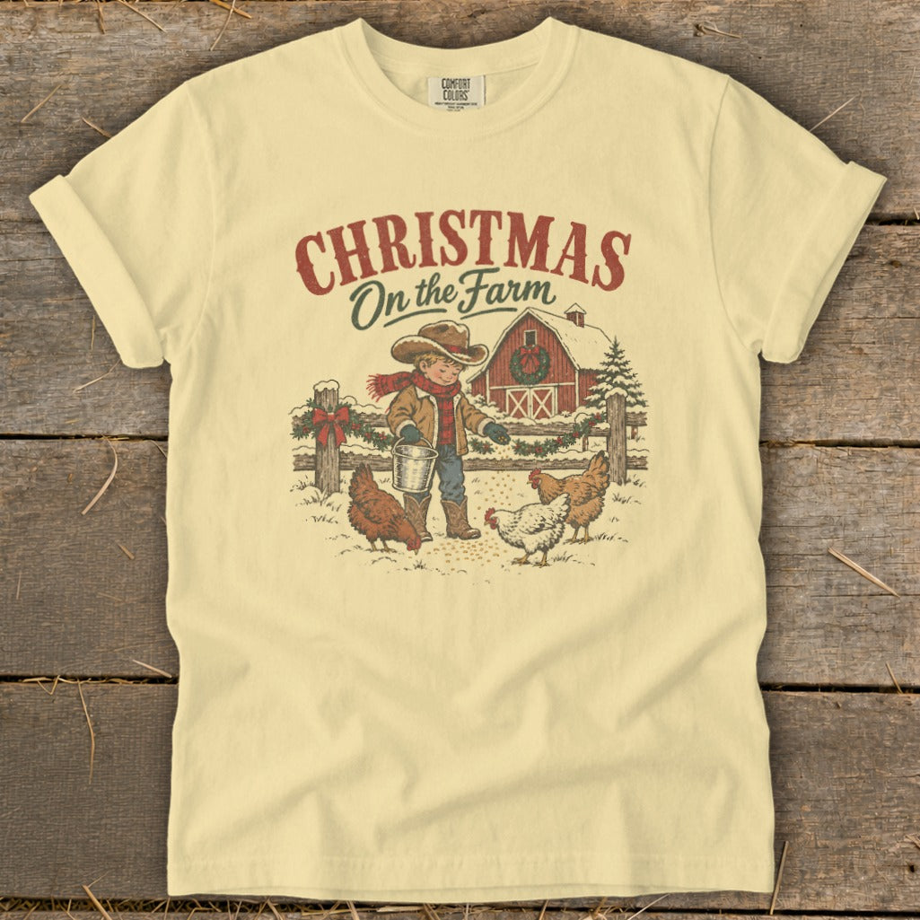 Christmas on the Farm graphic with a boy feeding chickens in the snow by a barn.