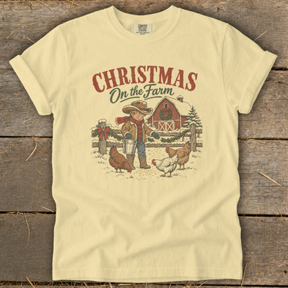 Christmas on the Farm graphic with a boy feeding chickens in the snow by a barn.
