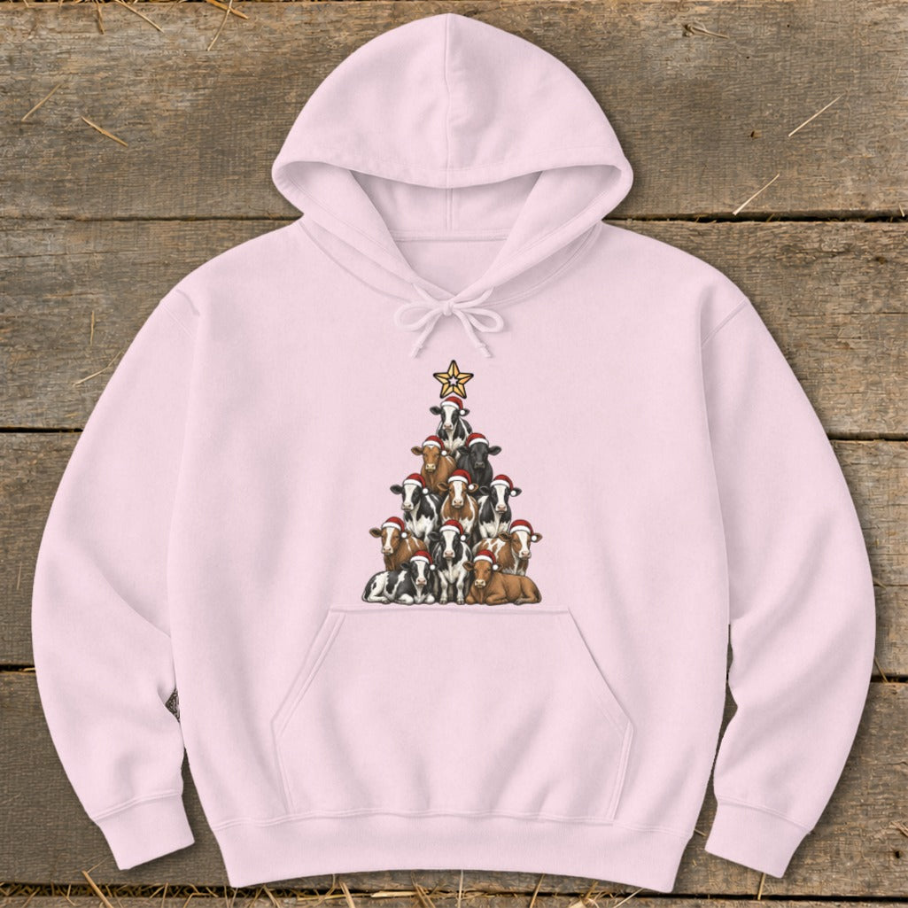 Pink hoodie with a Christmas tree made of cows wearing Santa hats.