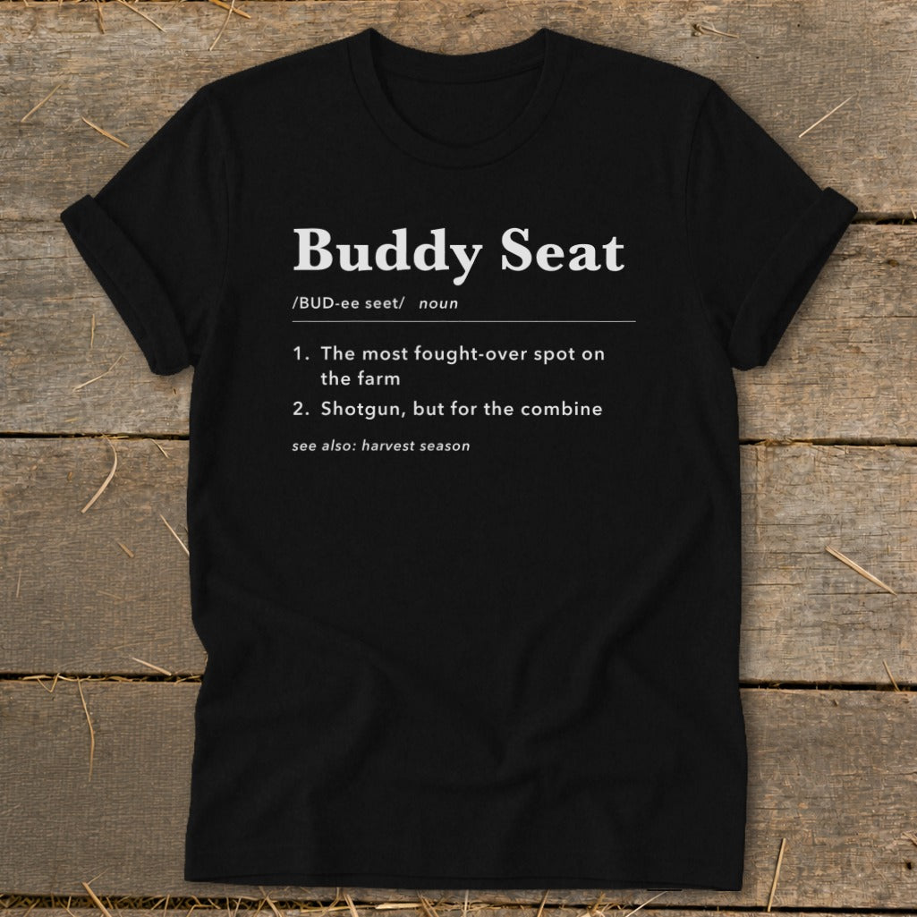 Black t-shirt with white text defining "Buddy Seat" with farm and combine references.