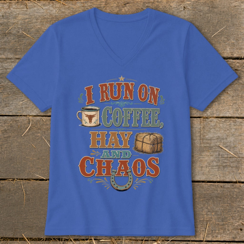 Blue v-neck shirt with "I RUN ON COFFEE, HAY AND CHAOS" text and graphics.