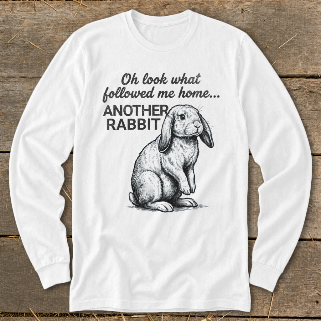 Long sleeve shirt with a sketch of a rabbit and the text "Oh look what followed me home... ANOTHER RABBIT".