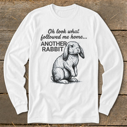 Long sleeve shirt with a sketch of a rabbit and the text "Oh look what followed me home... ANOTHER RABBIT".