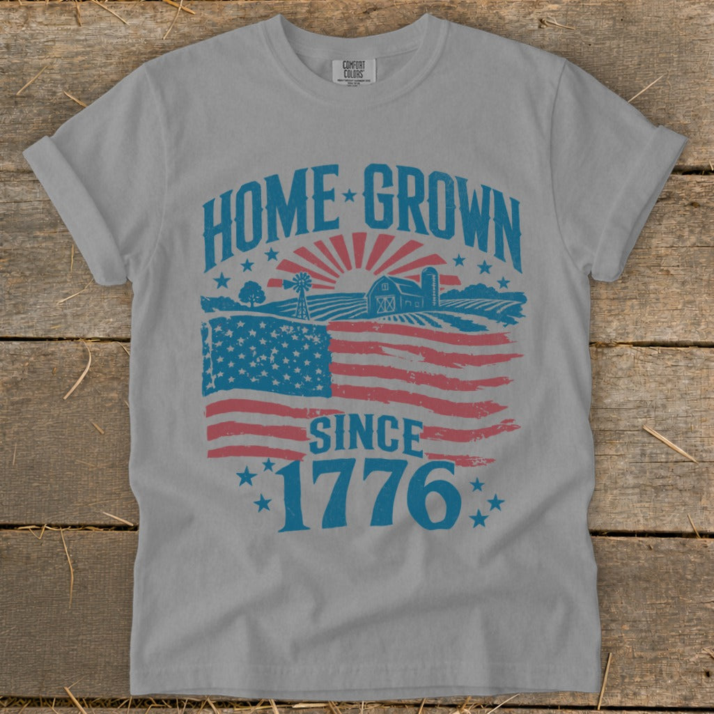 Gray t-shirt with "HOME GROWN SINCE 1776" and American flag farm graphic.