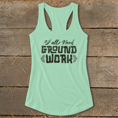 Mint green tank top with "Y'all Need GROUND WORK" graphic print.