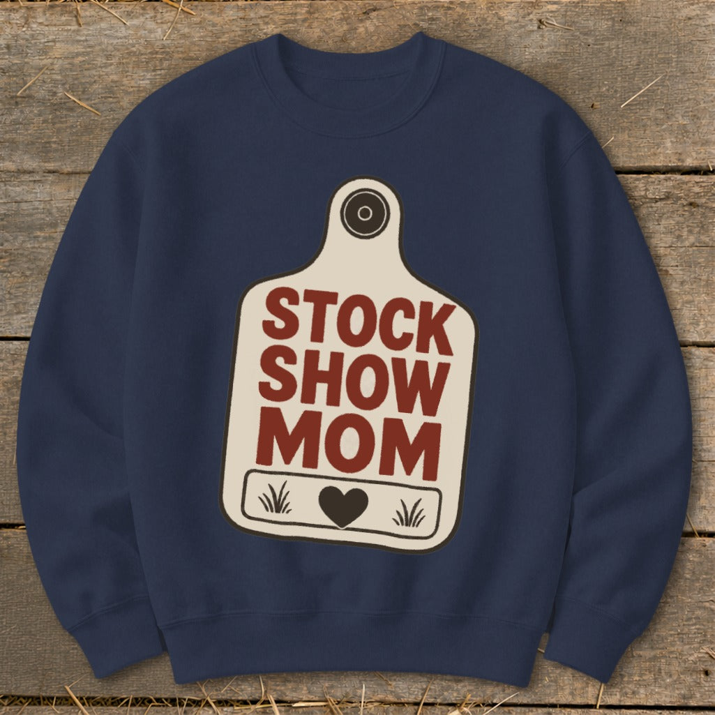 Navy sweatshirt with a cream tag graphic reading "STOCK SHOW MOM" and a heart.