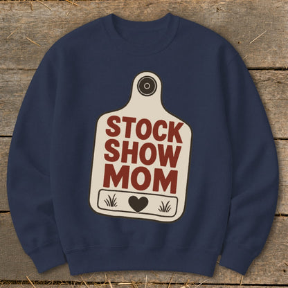 Navy sweatshirt with a cream tag graphic reading "STOCK SHOW MOM" and a heart.