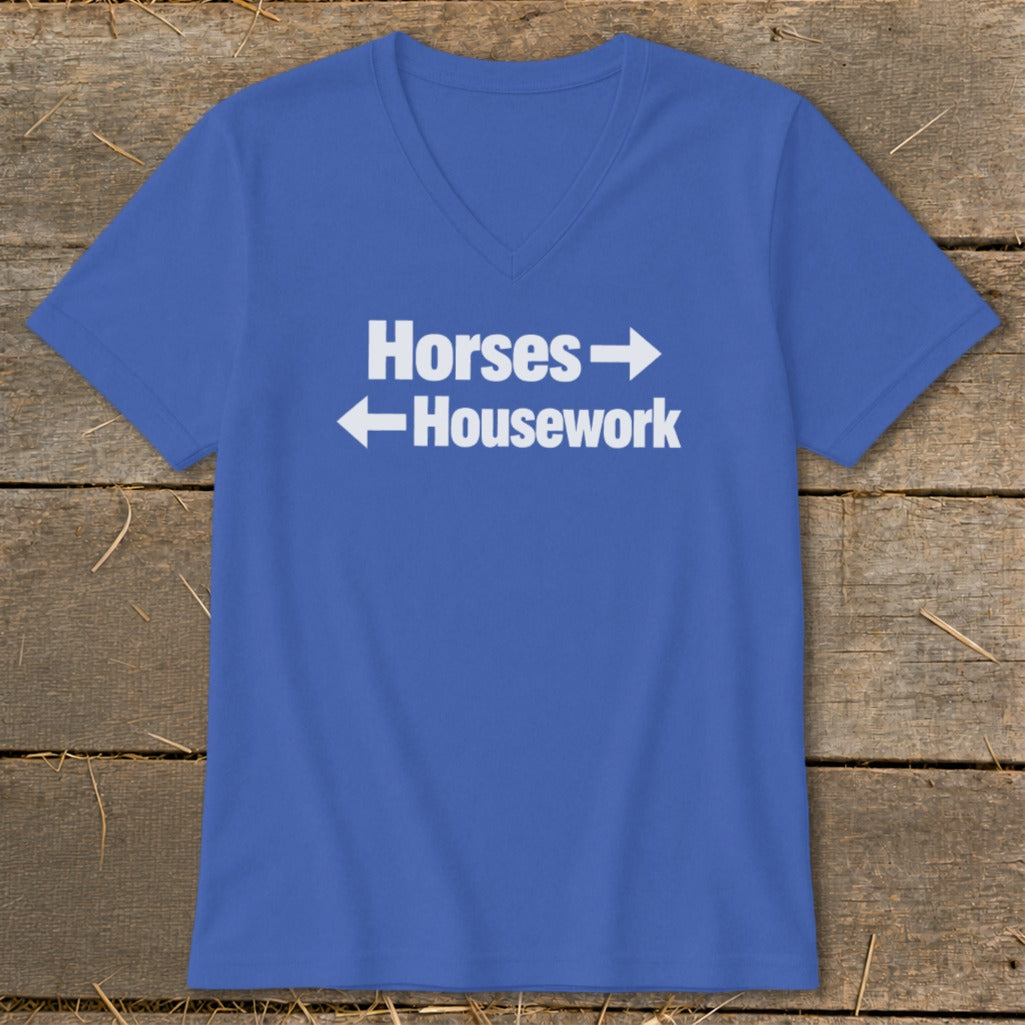 Royal blue women's v-neck t-shirt with white text reading "Horses" pointing right and "Housework" pointing left.