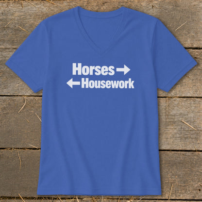 Royal blue women's v-neck t-shirt with white text reading "Horses" pointing right and "Housework" pointing left.