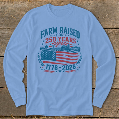 Blue long-sleeve shirt with "Farm Raised For 250 Years 1776-2026" and American flag graphic.