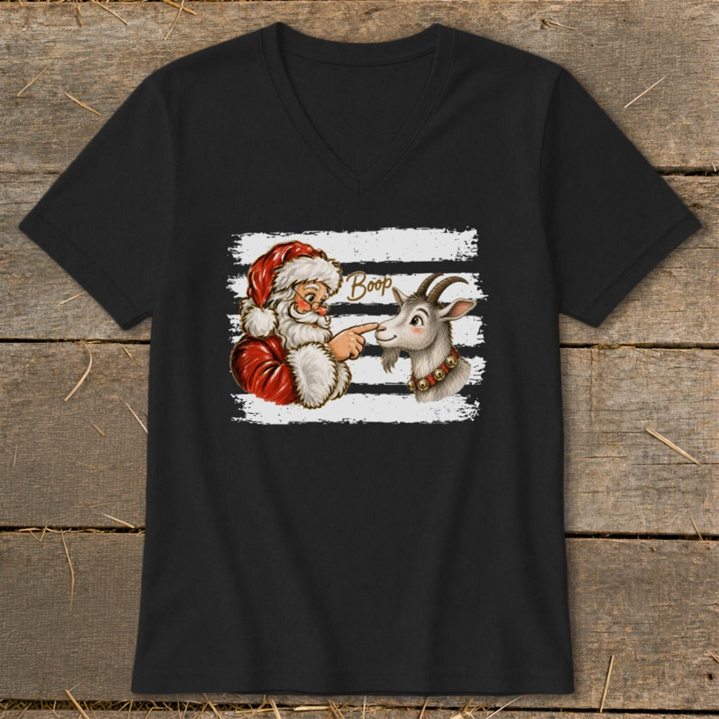 Santa touching a goat's nose with the word "Boop" above.