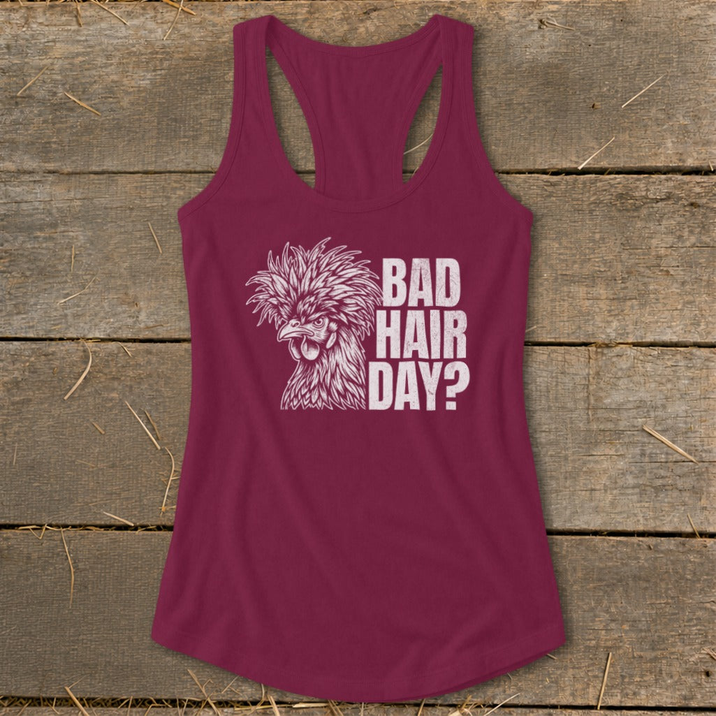 Maroon racerback tank top with a graphic of a crested chicken and the text "BAD HAIR DAY?".
