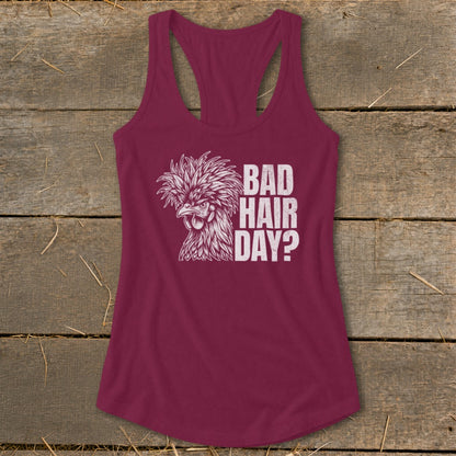Maroon racerback tank top with a graphic of a crested chicken and the text "BAD HAIR DAY?".