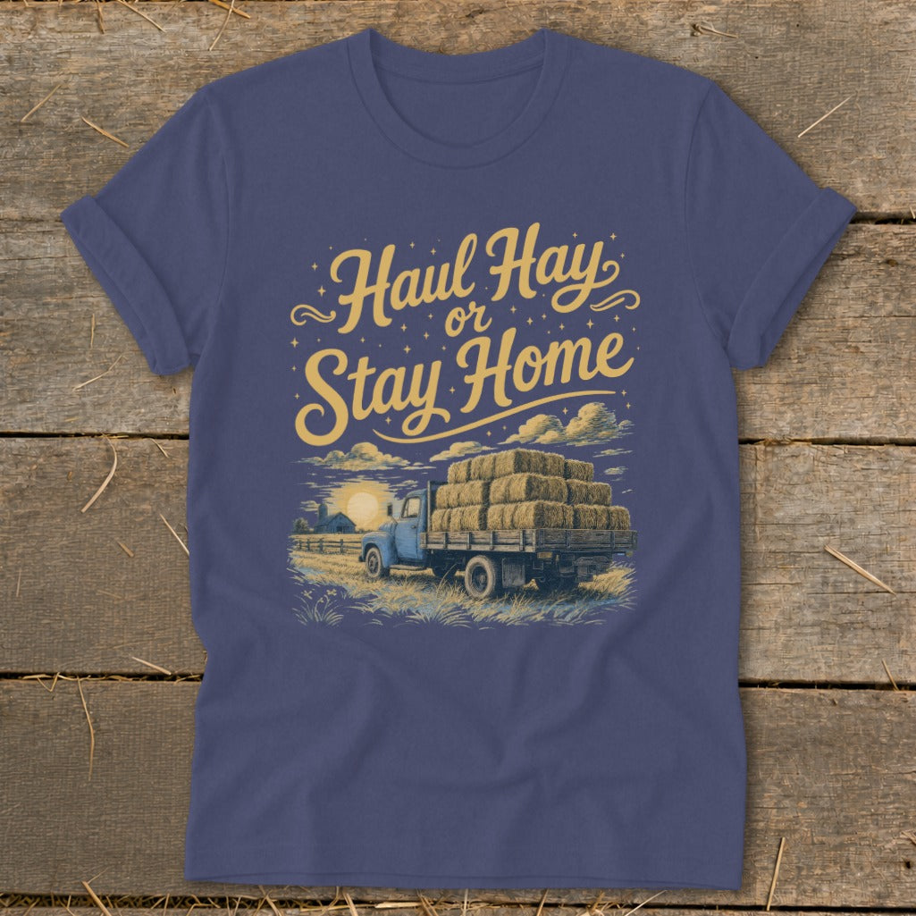 T-shirt with "Haul Hay or Stay Home" text over a blue truck hauling hay bales.