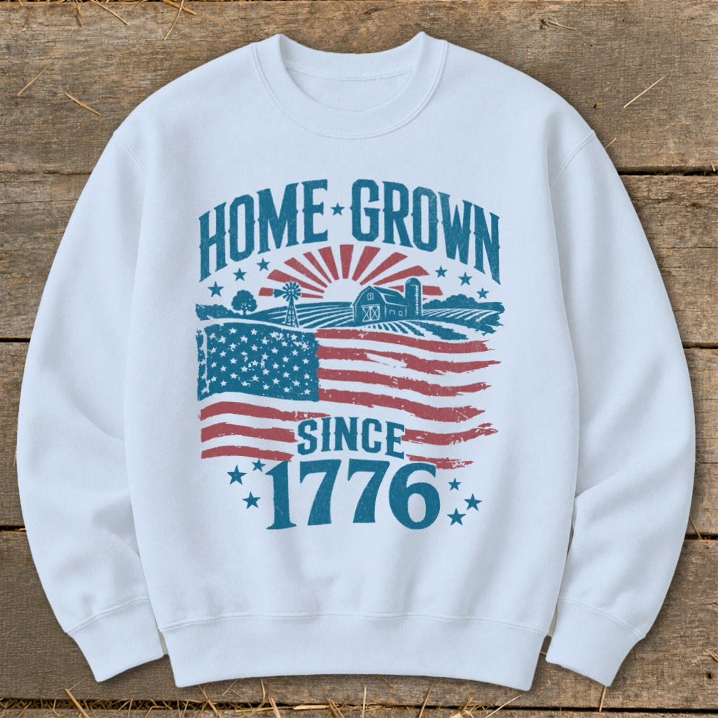 White sweatshirt with "Home Grown Since 1776" graphic featuring American flag and farm scene.