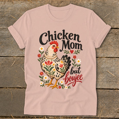 Chicken Mom but boujee graphic on a pink t-shirt with a hen and flowers.