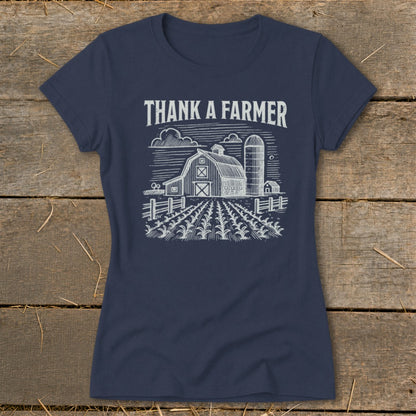 Navy t-shirt with "Thank a Farmer" text over a barn, silo, and cornfield graphic.