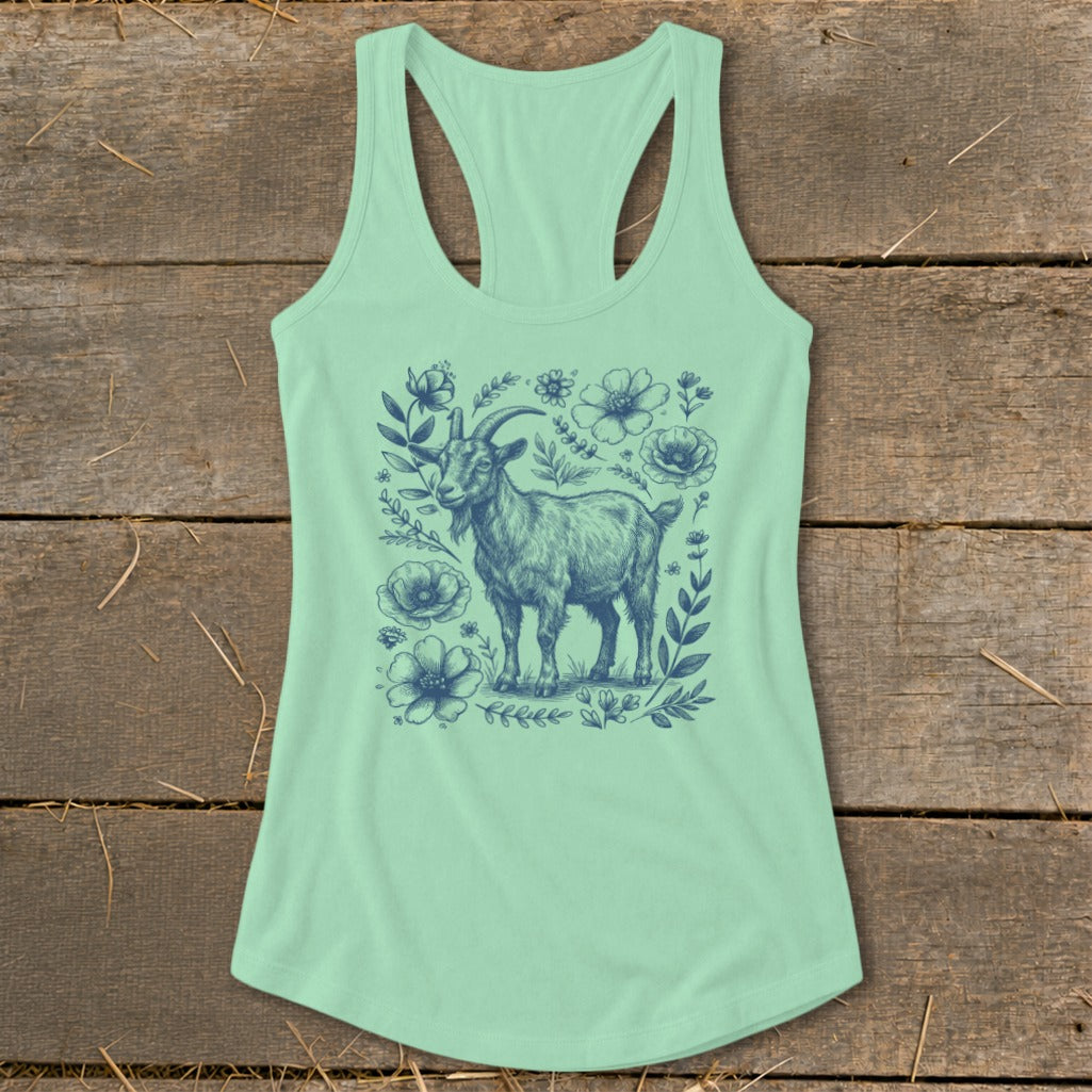 Mint green tank top with a blue sketch of a goat surrounded by flowers.