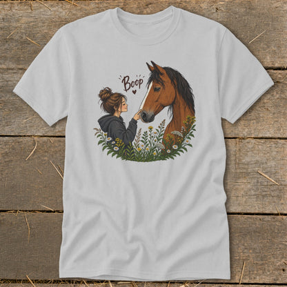 Illustration of girl touching horse nose, with "Boop" text and flowers.