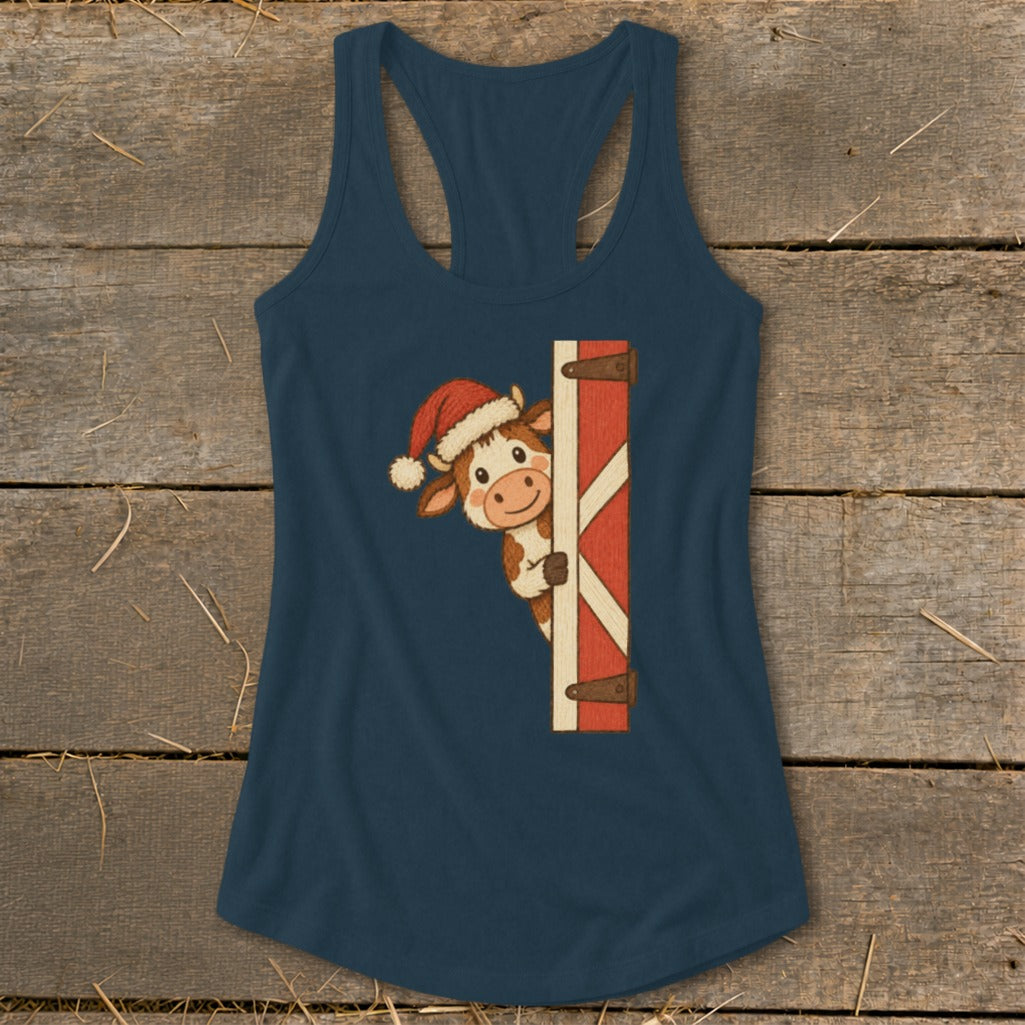 Dark blue tank top featuring a cartoon cow wearing a Santa hat peeking from behind a barn door.