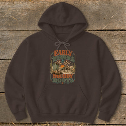 Brown hoodie with "Early Mornings & Muddy Boots" graphic of boots, barn, and sunset.
