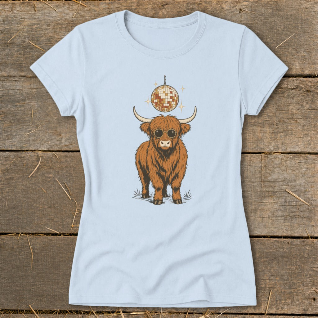 Highland cow wearing sunglasses with a disco ball above on a light blue t-shirt.