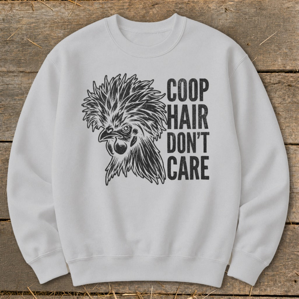 White sweatshirt with black graphic of a chicken and text "COOP HAIR DON'T CARE".